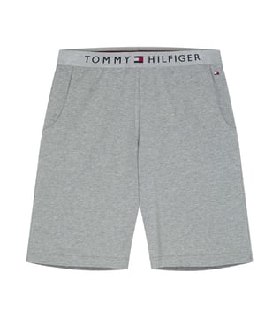 Mens Tommy Hilfiger Jersey Loungewear Shorts in grey.- Branded elasticated waistband.- Pouch pockets.- Embroidered Tommy Hilfiger Flag logo is situated on the left hip.- Regular fit.- Ref: UM0UM01203004