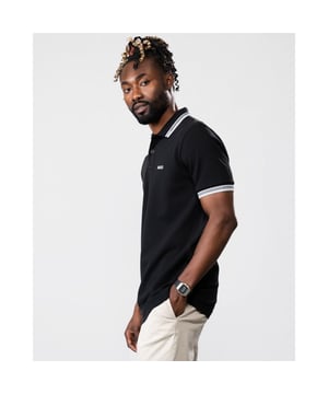 A signature polo shirt by BOSS Menswear, cut to a regular fit. Featuring contrast tipping and a logo at the left chest, this short-sleeved polo shirt is designed in cotton piqué and detailed with further BOSS branding at the undercollar.
Regular fitFlat-knit collarNumber of buttons: 3Short sleevesFlat-knit cuffsStandard length
100% Cotton
50469055
Model is 5"8 and wears size M