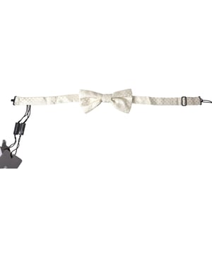 Prachtig ivoor fantasiepatroon
  Verstelbare Papillon Vlinderdas in de Nek
  100% authentieke Dolce & Gabbana
  Gloednieuw met tags
  Gebonden in stijl
  100% zijde materiaal
  Verstelbare nekband
  Een maat voor iedereen
  Breedte: 55 cm lengte: 115