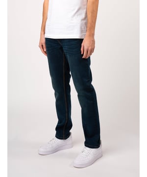 LUKE shows off a cool and contemporary aesthetic with these Edward denim jeans. The back waistband is decorated with a black faux leather patch which is debossed with the brand's iconic lion head and the LUKE EST.1977 text. These jeans are a regular fit, cut from a comfortable stretch-infused cotton denim and are complete with five pockets and a glossy button fastening. Iconic LUKE tri-colour trim tape. Regular fit. Black faux leather patch with the debossed lion logo and LUKE EST.1977 text. Black glossy button fastening. LUKE denim text round rivet featured on the two front main pockets. Metal lion head rivet on the front right pocket. Internal pocket with 'SOMETHING FOR THE WEEKEND SIR?' embroidered on the front.