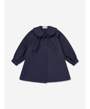 Mama Luma incorporate beautiful eco-friendly materials into their sophisticated handmade constructions. This girls navy long coat is reflective of the Californian label's precision of beauty. It showcases a Peter Pan collar, tie-up bow and balloon sleeves.  Cuffs Cotton Lining