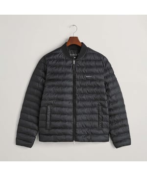 Lightly padded and quilted  this bomber jacket from GANT is ideal for transitional weather. Made with 100% recycled polyester filling and treated with a water-repellent finish  it features a ribbed collar  welt side pockets and elasticated cuffs. The fit is regular and sits just above the hips. This product has sustainability attributes in all layers: shell  lining and padding. All layers are made with recycled polyester.