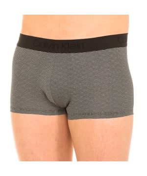 Calvin Klein boxer.
 Color Black
 Elastic rubber waistband, with the name of the company embroidered.
 Comfortable and breathable fabric.
 Anatomical front, with the ability to hold without tightening.
 Matching visible seams.

 Composition:
 88% Nylon - 12% Elastane

 Washing instructions:
 -Wash at max. 40 ° C.
 -Do not use bleach.
 -Admits dry cleaning.
 -Allows you to use a dryer.
 -Iron at max. 130 ° C.