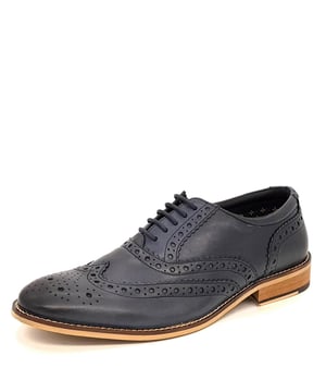Traditional hand finished shoe with a classic brogue design and a must for any man's wardrobe for a perfect fit with formal attire. Made from genuine high quality burnished leather and cusion insole for superior comfort. These are soft to touch and look great with suits and smart wear. Handmade leather shoes with Genuine leather upper.