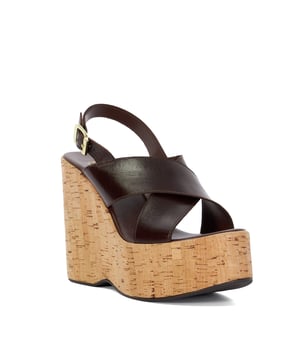Step out in style this spring/summer and meet Kaiden: statement wedge sandals that will take your look to the next level. Made from premium leather and designed with a very high heel, this open-toe design features a secure and comfy buckle fastening.
