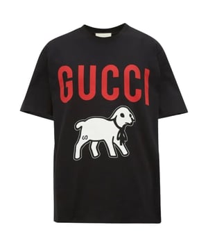 Gucci Black Tee, 100% Cotton, Made In Italy, Lamb Design On Front, This tee is Oversized in length, your regular fit should be perfect for this tee but be aware the length is longer than a typical tee. 