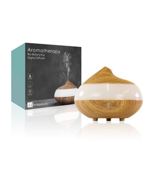 Dr. Botanicals Bio-Balance Wooden Aroma Diffuser is a new technology therapy device that brings together aromatherapy, light-therapy and an air purifier. It features 7 changing light colours to create different moods to the room, 2 mist modes that regulate the scent from deep to light if used with essential oils* and provides fresh humidification for dry indoor air.

Features:
- Lasts 1-3 hours with one fill
- 7 Colour moods of LED light and 2 Mist modes
- Whisper quiet
- Box includes 1 aroma diffuser, 1 adapter and 1 manual

Benefits:
- Relax or uplift your mood with scents from essential oils*
- Balance your ambiance with soft light
- Freshen the air in your home with Anti-dry protection