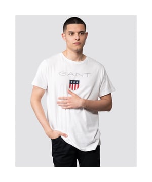 We're proud of our preppy, collegiate heritage, and this tee, with its large-scale shield design, nods to that history in style. Team with your favorite jeans or chinos for a timeless American sportswear look.

Regular fit
Lightweight cotton jersey
Crew neck
Short sleeves
Large-scale GANT shield print at chest