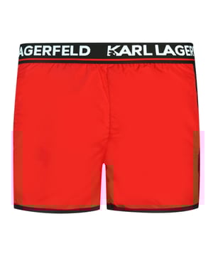 Karl Lagerfeld Taped Logo Red Swim Shorts. Karl Lagerfeld Beachwear Taped Logo On Waistband Red Swim Shorts. Elasticated Waistband. 100% Polyester. Drawstring Ties. Product Code - KL22MBS07