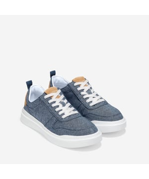 We've given our much-loved, signature GrandPro Rally Court Sneaker an update in organic canvas. Crafted from high-end-yet-durable materials, it features a luxuriously cushioned GRANDFOAM footbed, an EVA outsole, and a classic old-school sneaker vibe