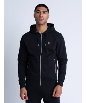 The wardrobe essential zip through hoodie from LUKE is cut from a cotton fleece back for added warmth in the cooler months and features two handy lower zip pockets. It is detailed with soft rib trims throughout and a chrome zip closure. The brand's iconic lion head embroidery sits on the left chest to finish the look.