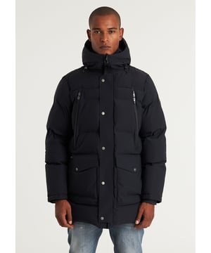 Material & Fit The Explorer Tech is a long winter coat with a regular fit. It is a technical jacket with an outer layer made of 65% recycled polyester and 35% polyester. The coat is sturdy with a lining of recycled nylon and filled with 100% recycled polyester. These layers make the jacket water-repellent, windproof, and breathable.  Details This winter coat features an adjustable hood, elastic cuffs in the sleeves, and eight pockets, including two inner pockets. The jacket has a double-sided, waterproof zipper and is finished with signature CHASIN’ details.  Specs  Water-repellent Windproof Breathable 8 pockets Plastic double-sided zipper Signature CHASIN' details The model is wearing size M, is 1.89 m tall, with a waist measurement of 76 cm.
