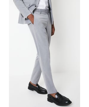 Introducing our Essential Skinny Fit Smart trousers, a must-have addition to your wardrobe. These trousers features a zip fly fastening for convenience and are designed to provide a sleek and polished look. Made with a polyester viscose blend with added stretch to ensure a cool and comfortable fit all day long. Pair these versatile trousers with matching items, perfect for any smart occasion.