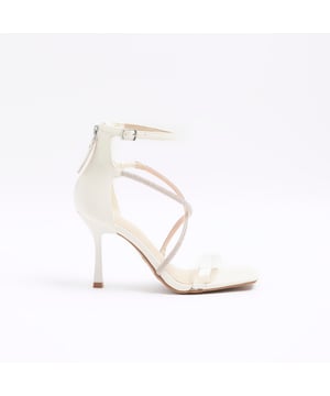Wide fit, Diamante strap, Open toe, Closed back, Ankle fastening, Zip fastening, Heel height: 9cm