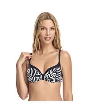 Bikinitop van het merk ORY.
 De badkamer van Ory is, nadrukkelijk, voor vrouwen die weten wat ze willen. Een aantal prachtige badpakken en bikini's, vol fantasie maar tegelijkertijd super corsetisch. Deze zwemcatalogus is gemaakt voor vrouwen met middelgrote tot grote borsten die op zoek zijn naar schoonheid en goede ondersteuning.

 Flatterende bikinitop met verlengd decolleté, foam cups, beugel en decoratief detail tussen de cups.
 Met geïntegreerde pads.
 Vaste verstelbare bandjes.
 Clipsluiting.
 Cutting-edge stof met hoog vormend vermogen, hoge weerstand tegen chloor, zonnecrèmes en oliën en uitstekende vochtabsorberende eigenschappen.
 Samenstelling: Buitenvoering: 88% Polyamide, 12% Elastaan; Binnenvoering: 52% Elastaan, 38% Lycra, 10% Polyamide; Cup: 100% Polyester.
 Onderhoud:
Handwas.
 Geen bleekmiddel gebruiken.
 Het gebruik van een droger is niet toegestaan.
 Het gebruik van een strijkijzer is niet toegestaan.
 Niet draaien om uit te lekken.
