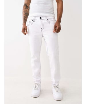 Change out those classic blues and opt for something brighter. The Rocco Big T Skinny Jean is white, bright, and perfect for summer featuring a zip fly, belt loops, and contrasting Big T stitching. Finished with five pocket construction, horseshoe detailing on the back, and a shorter 32" inseam. 