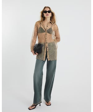 Collared, Button fastening, Long sleeves, Sheer design