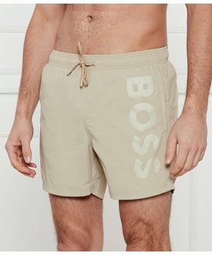 STYLE OCTOPUS – 50515296
Statement swim shorts with full lining by BOSS, designed in soft quick-drying poplin featuring a vertical logo print on the left leg. For our BETTER BOSS products, we always use at least 60% better raw materials. This product is made from at least 60% recycled polyamide. By using recycled polyamide, we aim to save resources by making use of existing plastic material. Recycled nylon is usually made from pre-consumer spinning or fabric waste and may also come from post-consumer industrial fishing nets. We only use raw materials with a verified chain of custody to ensure the use of certified recycled polyamide.
100% Polyamide (recycled), Lining: 100% Polyester
30°C fine wash
Do Not Bleach
Do Not Tumble Dry
Do Not Iron
Do not chemical dry clean
The model wears a size M and is 189 cm tall with a, 98 cm chest, 80 cm waist and 94 cm hips.