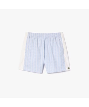 Men's Lacoste Mid Length Monogram Print Swim Trunks.- Recycled polyester made from manufacturing offcuts.- Adjustable, elasticated waistband with eyelets.- Integrated mesh briefs.- 3 pockets.- Embroidered crocodile on side. Material: 100% Polyester. Ref: MH6980WB5.