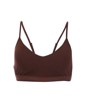 Dames Puma Move Yogini Bra in bruin.- V-hals.- Verstelbare bandjes.- Uitneembare pads.- dryCELL: Performance technologie ontworpen om vocht van het lichaam af te voeren en je vrij te houden van zweet tijdens het sporten.- 83% Nylon 17% Elastane.- Ref: 52483565