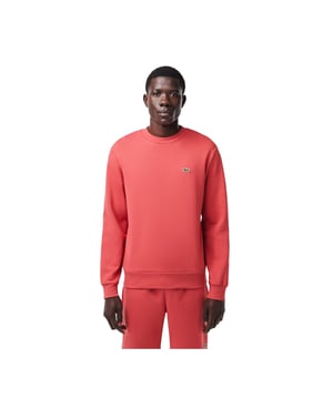 Timeless style renewed every season in a new color palette  in our signature details and a sustainable approach. Classic fit  natural ease on body with comfortable sleeves. Solid crewneck sweatshirt in brushed fleece made of organic cotton and recyled polyester. Piqué necktape in iconic Lacoste green. Embroidered 3cm green crocodile sewn on chest.