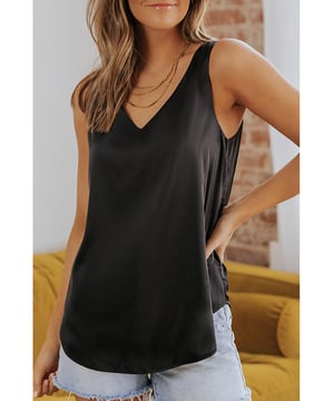 Top sin mangas holgado y elegante con escote en V profundo  
  El escote en V profundo añade atractivo al diseño  
  Corte holgado para una sensación cómoda y relajada  
  Fabricado con materiales de calidad para mayor durabilidad  
  Adecuado para salidas informales o para estar en casa  
  Perfecto para combinar con jeans, faldas o pantalones cortos  
  Una adición imprescindible a cualquier guardarropa femenino  