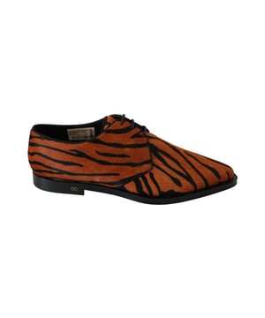 Gorgeous brand new with tags
  100% Authentic Dolce & Gabbana Shoes
  Model: Dress shoes
  Color: Orange and black Tiger pattern
  Material: Pony Hair
  Leather sole
  Logo details
  Made in Italy
  Very exclusive and high craftsmanship