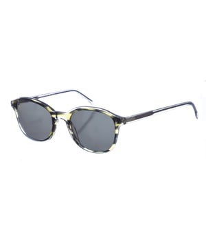 Gafas de sol Zen con montura de acetato.
Color Transparente-negro-marrón
Forma squared.
Lentes de color Verde
Patillas de acetato.
100% Protección UV. 
Incluye una funda neutra de tela.

Medidas  Alto lente: 48 mm
Ancho lente: 49 mm.
Puente: 21 mm.
Patillas: 145 mm.

Limpieza y manutención:
-Limpiar las gafas con agua y jabón (neutro).
- No utilice paños sucios o abrasivos, que puedan alterar las características de los filtros.
- Utilice solo accesorios y repuestos originales.