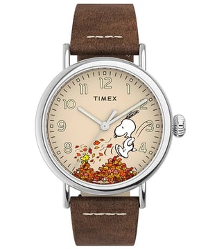 This Timex Standard X Peanuts Fall Analogue Watch for Unisex is the perfect timepiece to wear or to gift. It's Silver 40 mm Round case combined with the comfortable Brown Leather watch band will ensure you enjoy this stunning timepiece without any compromise. Operated by a high quality Quartz movement and water resistant to 5 bars, your watch will keep ticking. This fashionable and classic watch matches any outfit at any occasion,it adds style to your life -The Analogue watch has a function: Luminous Hands High quality 20 cm length and 19 mm width Brown Leather strap with a Buckle Case diameter: 40 mm,case thickness: 9 mm, case colour: Silver and dial colour: Beige
