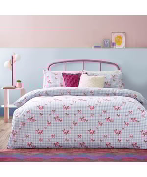 Brighten up your bedroom with the Gingham Bows Checked Duvet Cover Set, a perfect blend of classic charm and contemporary playfulness. Featuring a timeless gingham pattern adorned with delicate bows, this set adds a subtle yet striking detail to your space. The reversible design, with a small-scale check on the reverse side, offers effortless versatility, giving you two stylish looks in one. Crafted from a durable polycotton blend, it promises a soft touch, easy care, and a relaxed finish. Elevate your home with a piece that combines trending design with timeless charm, perfect for creating a cosy yet refined retreat.
