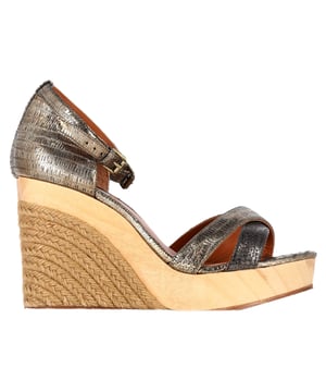 VINTAGE, RRP AS NEW
Step into luxury and modern elegance with the Lanvin Snake-Embossed Espadrille Slingback Wedge Sandals in Silver Leather. Crafted from premium silver leather, these sandals feature a striking snake-embossed texture that adds depth and sophistication to their design. The slingback strap ensures a secure and comfortable fit, while the espadrille wedge heel combines timeless style with a contemporary edge. The metallic silver finish elevates any look, making them the perfect statement piece for both daytime and evening wear. Whether paired with dresses, skirts, or cropped trousers, these sandals add a touch of glamour and edge to your summer wardrobe.

 Lanvin Snake-Embossed Espadrille Slingback Wedge Sandals in Silver Leather

Condition: Excellent
Signs of wear: No visible sign of wear. No Mark at insole.,  Very light mark at soles.
Packaging: Dust bag
Color: Silver
Material: Leather | leather
Size: FR | 40/UK7/US8/IT39
Measurements: Heel height: 110; Insole length: 240
SKU: NAPPUGBSH424966W