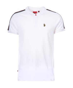 Luke 1977 is, without a doubt, the go-to brand if you're after well-crafted, witty and masculine products. Finished with the signature Luke Lion logo, you're looking at one of the UK's top contemporary menswear brands. The New Willtape Polo Shirt combines comfort and style, ensuring you look great in and out of the house. Crafted from pure cotton pique. Featuring a ribbed polo collar, a three-button placket, short sleeves with ribbed cuffs and elasticated tape on the shoulders and sleeves which is detailed with a raised LUKE 1977 text. Finished with the iconic Luke lion at the chest. Regular Fit, Pure Cotton Pique, Ribbed Polo Collar, Three Button Placket, Short Sleeves with Ribbed Cuffs, Raised Text Elasticated Jacquard Tape, Luke 1977 Branding. Style & Fit: Regular Fit, Fits True to Size. Composition & Care:100% Cotton, Machine Wash..