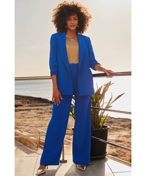 That colour looks great on you Cut for a comfy but chic relaxed fit Flattering wide-leg silhouette you can dress up or down Add the matching blazer for maximum impact Let the cobalt pop with a simple white top Do smart-casual with sandals or trainers, elevate them with wedges and heels Inside leg to fit: Short 29" | Regular 31" | Long 33"