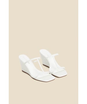 Great outfits deserve great shoes
Trending minimalist strappy style
Square toes are so now
Wear-all-day wedge heel
Style with wide-leg linen trousers on holiday
We love them with a silky slip dress too