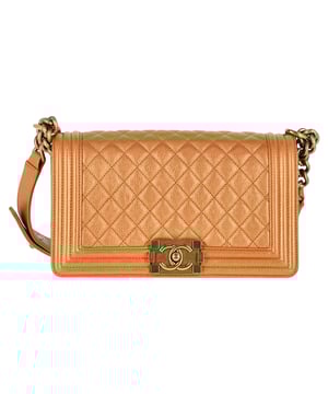 VINTAGE, RRP AS NEW
Elevate your ensemble with the timeless allure of the Chanel Quilted Medium Boy Flap Bag in sumptuous brown lambskin leather. This chic shoulder bag epitomizes luxury with its diamond-quilted pattern and opulent feel. The bag showcases an aged gold chain link shoulder strap adorned with a leather shoulder pad, providing both comfort and style. The focal point is the aged gold Boy Chanel CC press lock that adds a touch of glamour. Opening the front flap reveals a matching fabric interior that includes a convenient patch pocket for organization. Perfect for adding a touch of refinement to any outfit, this Chanel bag is an iconic piece that exudes sophistication and elegance in every detail.

with Dust bag

Chanel Quilted Medium Boy Flap Bag in Brown Lambskin Leather
Condition: Excellent
Signs of wear: No retail tag, No visible sign of wear., 
Packaging: Dust bag
Color: Brown | ochre
Material: Leather | Lambskin leather
Size: One Size
Measurements: Width: 80; Height: 150; Length: 260; Handle drop: 250; Strap length: 600
SKU: NAPPUGBBA385936W