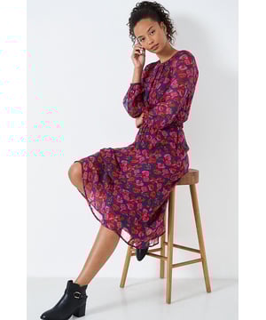 Say hello to the Lorie dress in a pretty rose pink print. The blouson sleeves are finished with elegant buttons, and the shirred waist ensures a flattering fit. Style with boots for a daytime look, or add heels for into the evening. Effortless elegance.

Floaty Fabric, fully lined
100% Viscose | Lining 100% Polyester
Round Neck
Midi Length
43-45" Shoulder to Hem
Long Balloon Sleeve
Sizing: As expected¬†
Fit: Stretch Fit - elasticated waist

These are end of line ex Crew Clothing,