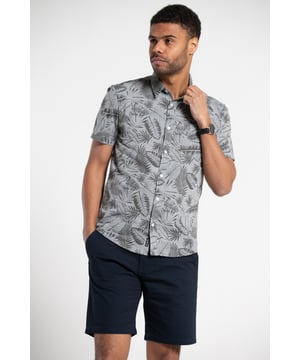Brighten up your wardrobe with this printed chambray shirt from Tokyo Laundry. Made from 100% cotton, this short-sleeved button-down is perfect for any occasion. The funky design features a comfortable fit, and stylish look. Add this versatile staple to your wardrobe today. Machine washable for easy care.