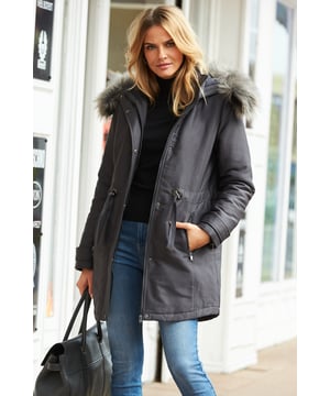 REASONS TO BUY: You'll wear it year after year. Classic parka design. Luxe faux fur hood for extra cosiness. Flattering drawstring waist. Go-with-everything grey shade. Wear it with jeans and boots or throw over a dress.
