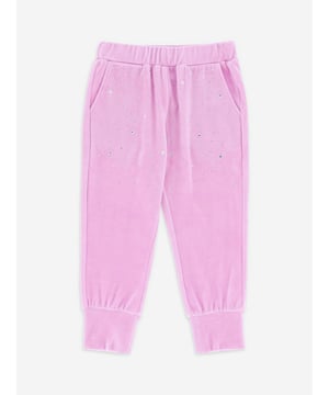 Introducing the exclusive Girls Bijou Crystal Velour Joggers in Pink by Angels Face ‚ your ultimate choice for AW2024. Impeccably crafted to blend fashion with comfort, these joggers are perfect for your girl's stylish endeavors. Key features include: Exquisite Crystal Details: Embellished with sparkling crystals to add a dash of glam. Luxurious Velour Fabric: Ultra-soft and richly textured for all-day comfort. Vibrant Pink Hue: A cheerful colour that brightens any outfit.Elevate her wardrobe with these enchanting joggers from Angels Face. A masterpiece of style and comfort!
