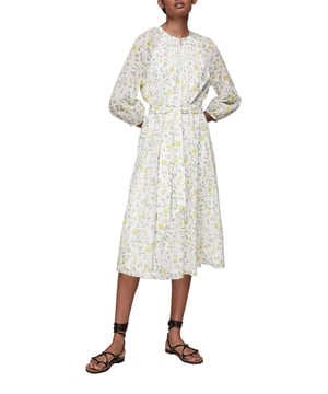 Discover the charm of the Savannah Floral Silk Mix Dress. Elegance meets comfort in this graceful midi silhouette.