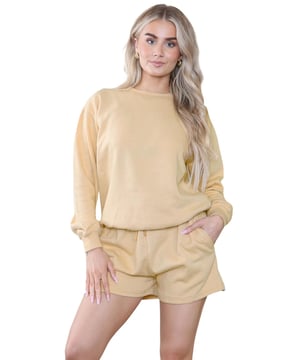 Introducing the Kruze Womens Tracksuit Set: a stylish and comfortable tracksuit set for women. The regular fit crew neck sweatshirt features ribbed waist and cuffs, while the soft fleece lining adds an extra layer of comfort. The accompanying shorts also feature a regular fit and an elasticated waistband with an adjustable drawstring for the perfect fit. Elevate your activewear game with this must-have set!