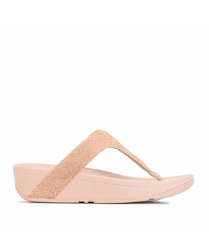 Dames Fit Flop Lottie Glitzy Toe Thong Sandalen in roségoud.- Slipsluiting.- Naadloos ingebouwd voetholtecontour.- Glinsterende stof. - Biomechanisch ontworpen.- Microwobbleboard Standard-technologie.- Slipbestendige rubberen buitenzool.- Ref.: R24323