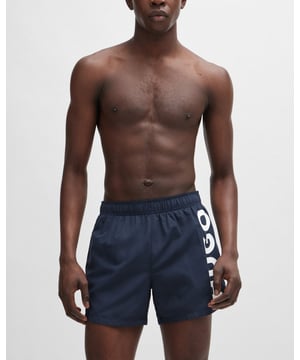 Modern swim shorts by HUGO. Designed in quick-drying fabric with full lining, this beach-ready pair features a vertical logo printed in contrast.
100% Polyester (recycled) , Lining: 100% Polyester
50513979