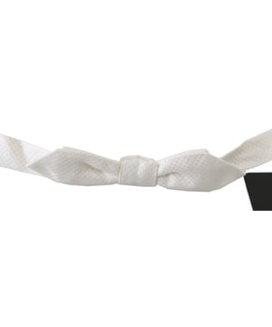 <ul>
  <li>Pajarita 100% autentica de Dolce & Gabbana</li>
  <li>A estrenar con etiquetas</li>
  <li>Articulo exclusivo de la coleccion Dolce & Gabbana</li>
  <li>Hecho de seda 100%</li>
  <li>Correa para el cuello de longitud ajustable</li>
  <li>Talla unica para todos</li>
  <li>Color: Blanco</li>
  <li>Fabricado en Italia</li>
</ul>