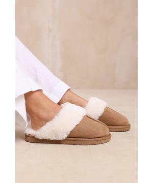 Experience ultimate comfort and cozy warmth with our Comfort Slip on Slippers With Fur Trim. These luxurious slippers are perfect for lounging at home or keeping your feet snug during colder seasons.Key Features:



Faux Fur Lining: The faux fur lining envelops your feet in warmth and softness, making these slippers a cozy sanctuary for tired feet. Say goodbye to cold toes and hello to ultimate comfort.

Easy Slip-On Design: These slippers feature a slip-on design, allowing you to effortlessly slide your feet in and out of them. Perfect for those relaxed and casual moments when you need to quickly put on cozy footwear.

Durable Sole: The durable sole provides traction and support, making these slippers suitable for both indoor and outdoor use. Enjoy the versatility of being able to step outside without changing your footwear.


Specifications:Material:


Upper: Synthetic
Lining: Faux fur for warmth and coziness
Sole: Durable sole for indoor and outdoor wear


Closure: Slip-on design for easy and convenient wearing


Pamper your feet with our Comfort Slip on Slippers With Fur Trim. Indulge in the utmost comfort and enjoy the luxurious feel of these slippers while effortlessly adding warmth and style to your everyday relaxation routine. Say hello to cozy evenings and happy feet with our irresistible slippers.