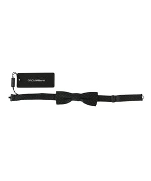 DOLCE & GABBANA Exclusieve zijden vlinderdas met grijs patroon
  100% authentiek
  Gloednieuw met tags
  Exclusief item uit de Dolce & Gabbana-collectie
  Kleur: Grijs met patroon
  Model: Gebonden
  Materiaal: 100% Zijde
  Verstelbare nekband
  Een maa
