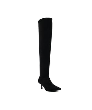 Our Spell over-the-knee boots look effortlessly contemporary. They're crafted in-house with textured faux suede and have a chic, pointy toe. The sleek kitten heel has been coated for a modern matte finish, instantly updating the design.