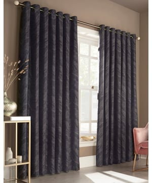 Add some glamour and style to your décor with this modern and chic curtain set. Featuring a luminescent jacquard pattern, inspired by natural marble and precious stones is accentuated when light catches. Perfect for a luxe styled bedroom or elegant living room, these curtains are bound to make a statement.