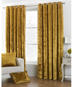 The Verona crushed velvet ringtop eyelet curtains provide you with a opulent centrepiece for your home. The velvet-look material and insulating properties will keep you feeling cosy in the colder months while it's room dakrening design will shield you from the low winter sun. Large ringtop detailing make it easy to install, meaning no fussy hooks . The Verona eyelet curtains are available in a range of sizes and colours to suit even the quirkiest of homes. Coordinate with other Verona products to harmonize your bed with your curtains. Velvet has been picked as the statement fabric of choice for home interiors in 2018. Plush and regal the construction of the fabric allows it to catch and reflect light giving it a shimmering appearance. Velvet products have intensely rich colours and suit funkier, nontraditional spaces. Velvet is thick giving it room darkening properties along with an insulation barrier.