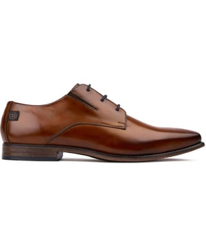 Step into the Bugatti dress shoes, a fusion of timeless sophistication and sharpness with a minimalistic, polished approach and added comfort. These black lace-ups feature a sleek leather upper with slim lacing for a dapper appearance, a comfortable, wider fit with discreet side gussets and a rubber outsole for a confident and comfy stride.